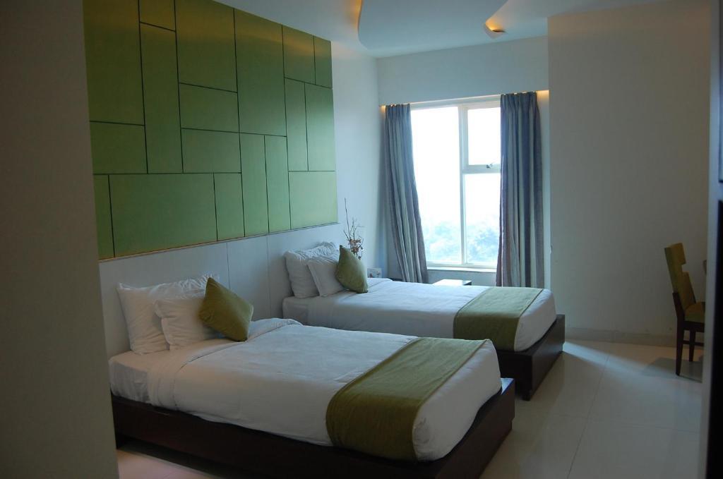 Rose Valley Orbit Hotel Siliguri Værelse billede